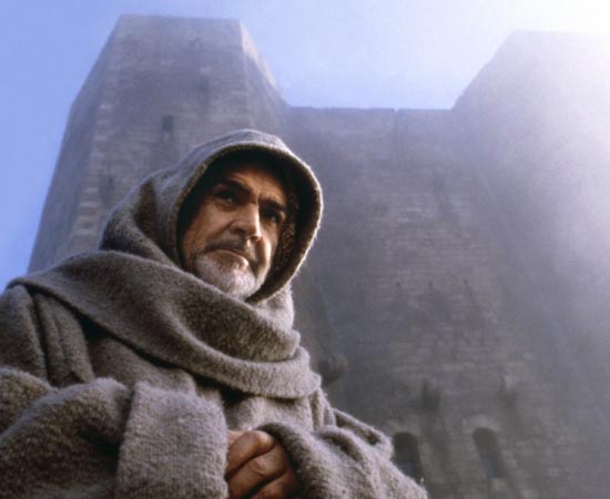 O Nome da Rosa (1986) - Estranhas mortes começam a ocorrer num mosteiro beneditino localizado na Itália durante a baixa Idade Média. No local, há uma biblioteca, onde poucos monges tem acesso às publicações sacras e profanas.<br>A chegada de um monge franciscano, incumbido de investigar os casos, irá mostrar o verdadeiro motivo dos crimes, resultando na instalação do tribunal da Santa Inquisição. O Nome da Rosa (1986) - Estranhas mortes começam a ocorrer num mosteiro beneditino localizado na Itália durante a baixa Idade Média. No local, há uma biblioteca, onde poucos monges tem acesso às publicações sacras e profanas.<br>A chegada de um monge franciscano, incumbido de investigar os casos, irá mostrar o verdadeiro motivo dos crimes, resultando na instalação do tribunal da Santa Inquisição.