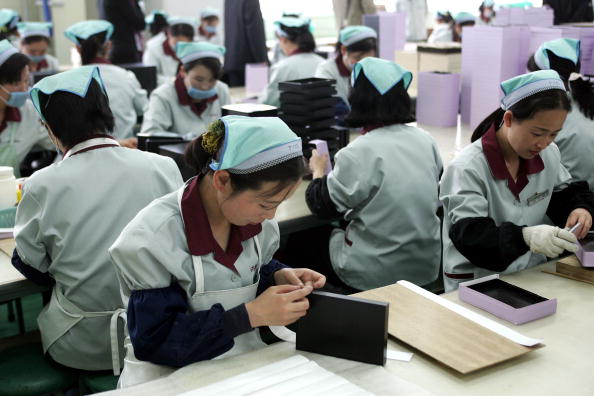 North Korean Workers Join Assembly Line At South Korean Industrial Complex