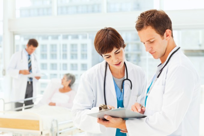 Doctors Looking at a Medical Chart