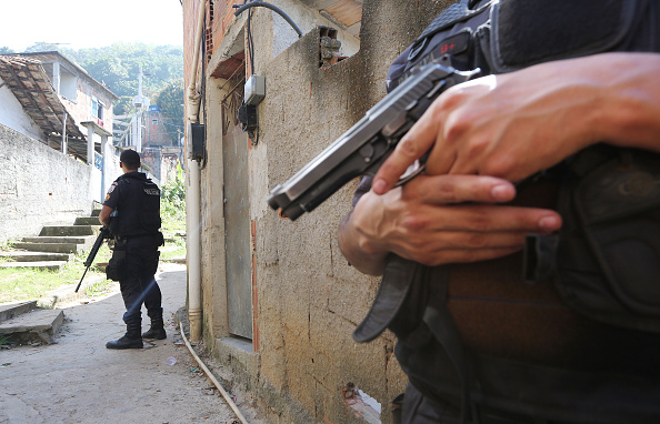 Pacifying Police Units Patrol Rio Favelas Ahead Of Olympic Games