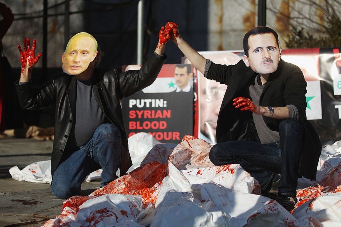 Activists Demonstrate Against Assad And Putin In Front Of The United Nations