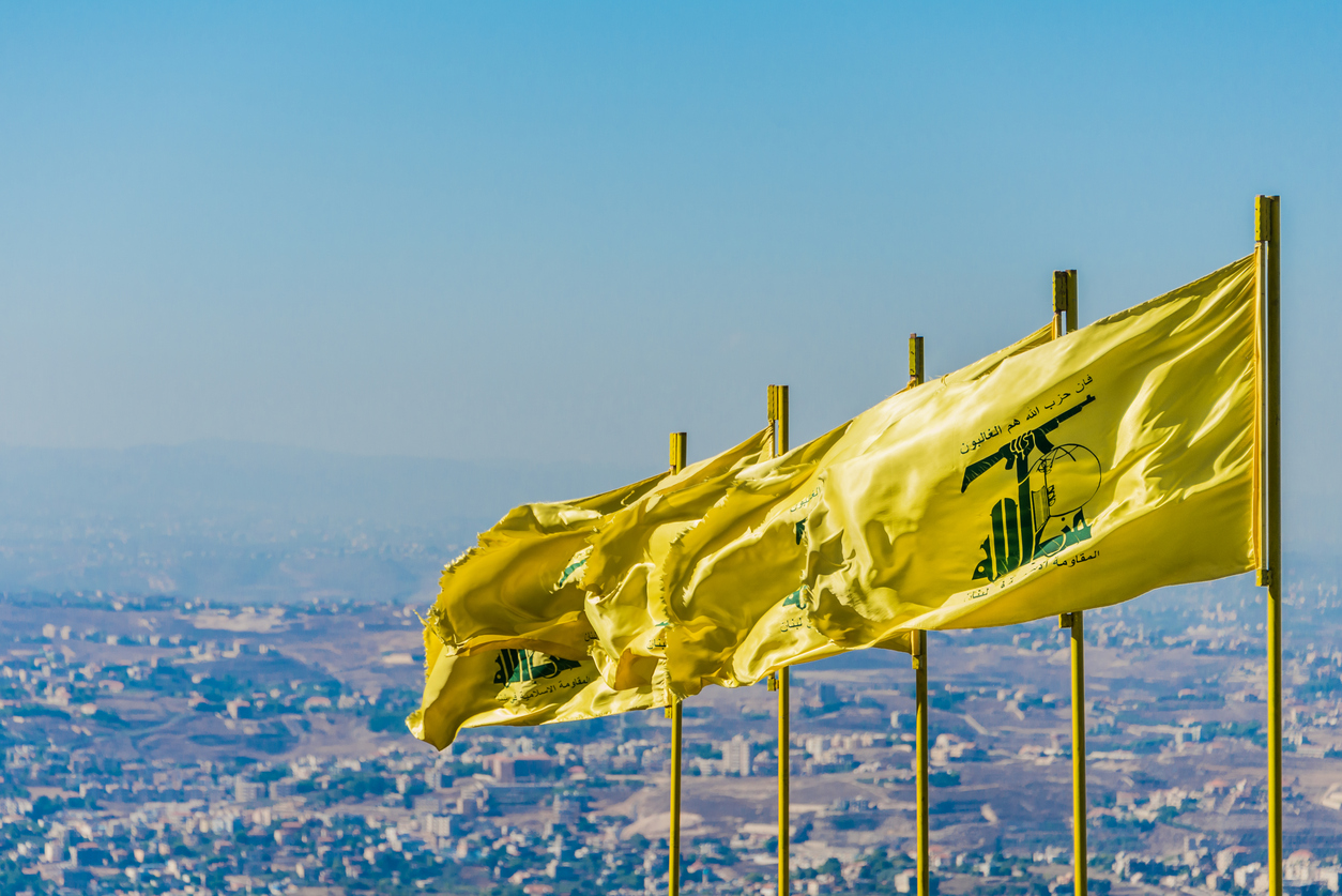 Hezbollah flags fly over southern Lebanese land