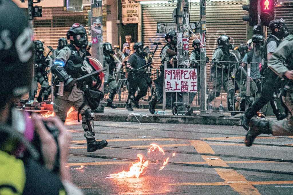 Qual a origem dos protestos nas ruas de Hong Kong?