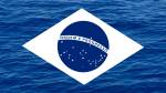 Bandeira do Brasil projetada em imagem de águas oceânicas